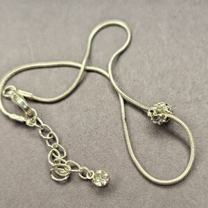 Sleek Silver Snake Chain Bracelet with Crystal Accent